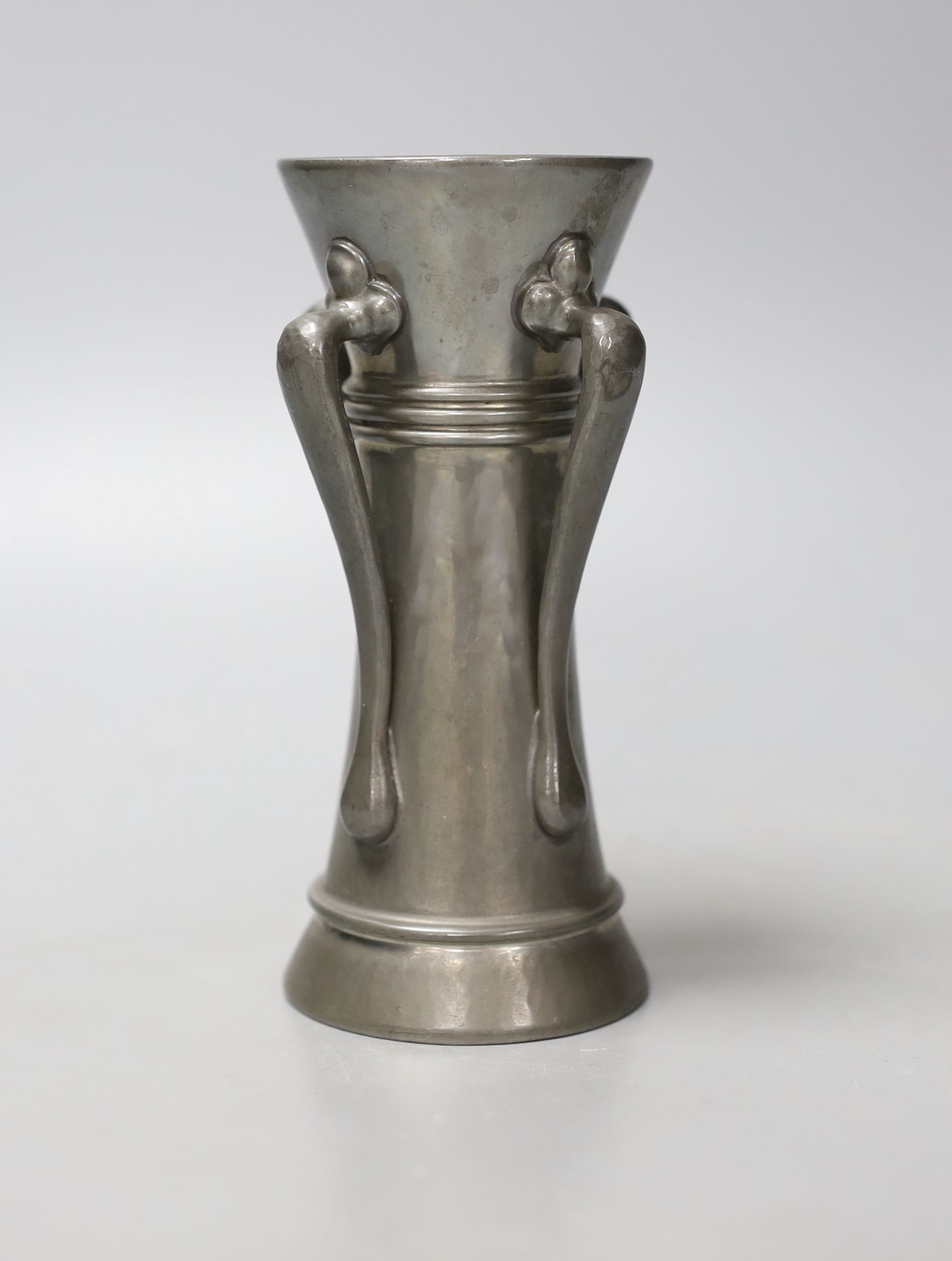 A Liberty’s Tudric pewter four-handled vase designed by Archibald Knox, shape 01214, 14cm. *This lot is being sold in aid of Prostate Cancer UK with 100% of the hammer price going to the charity”